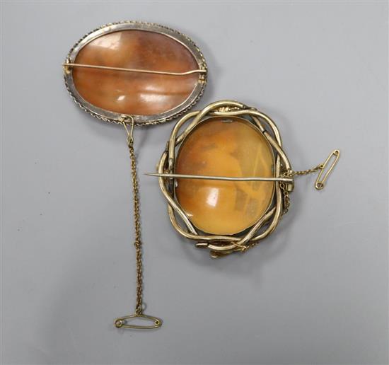 A pair of 18ct gold cufflinks, 7.2 grams and two Victorian cameo brooches.